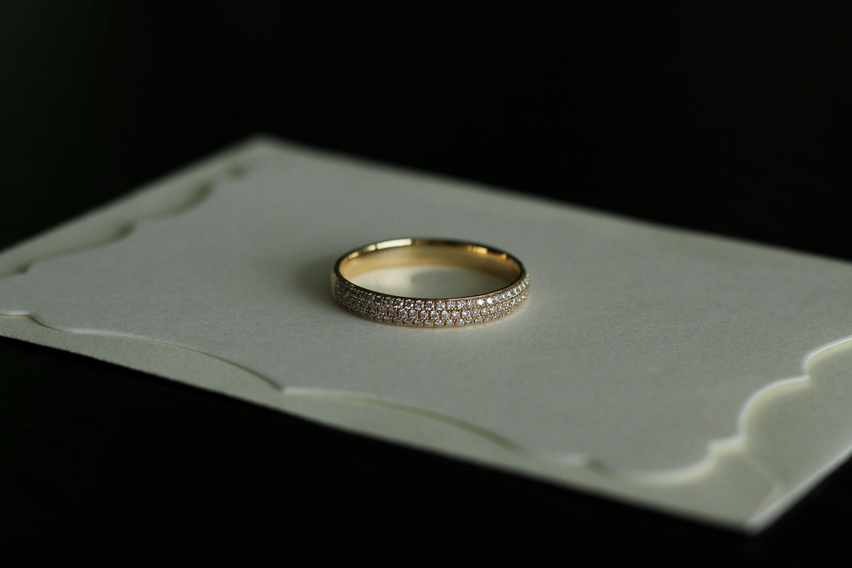 Half pavé diamond band