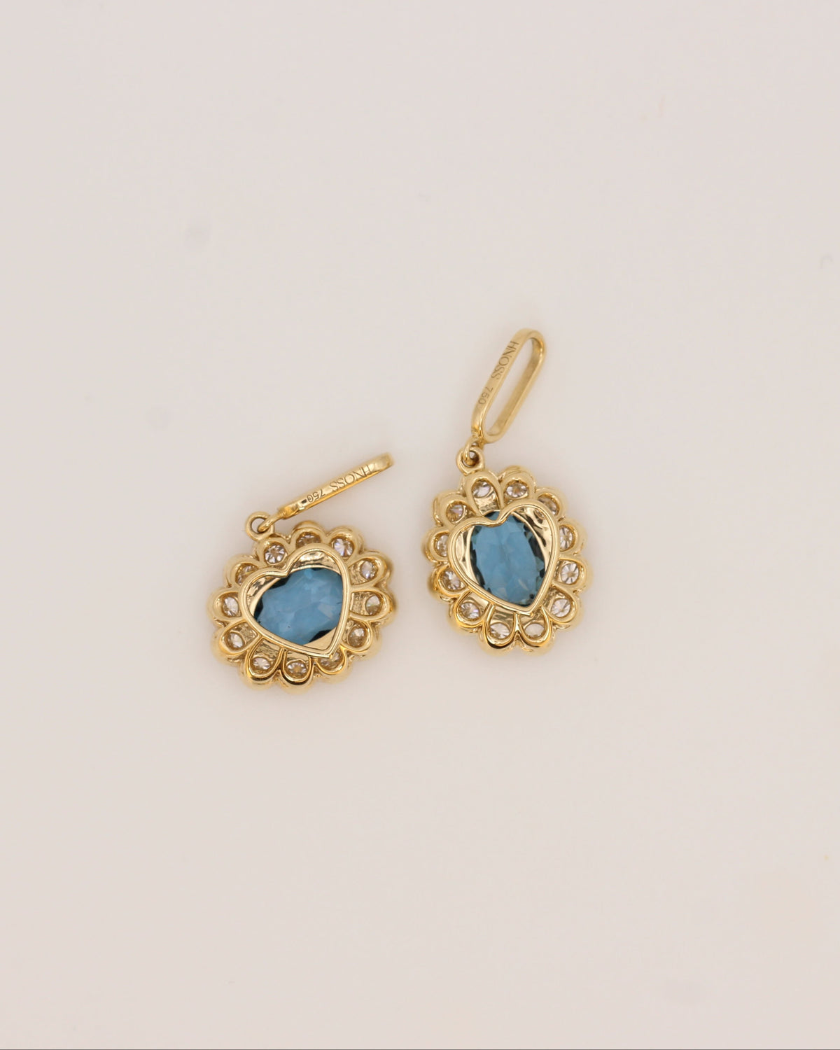 Sideways Blue Topaz Floral Pendant