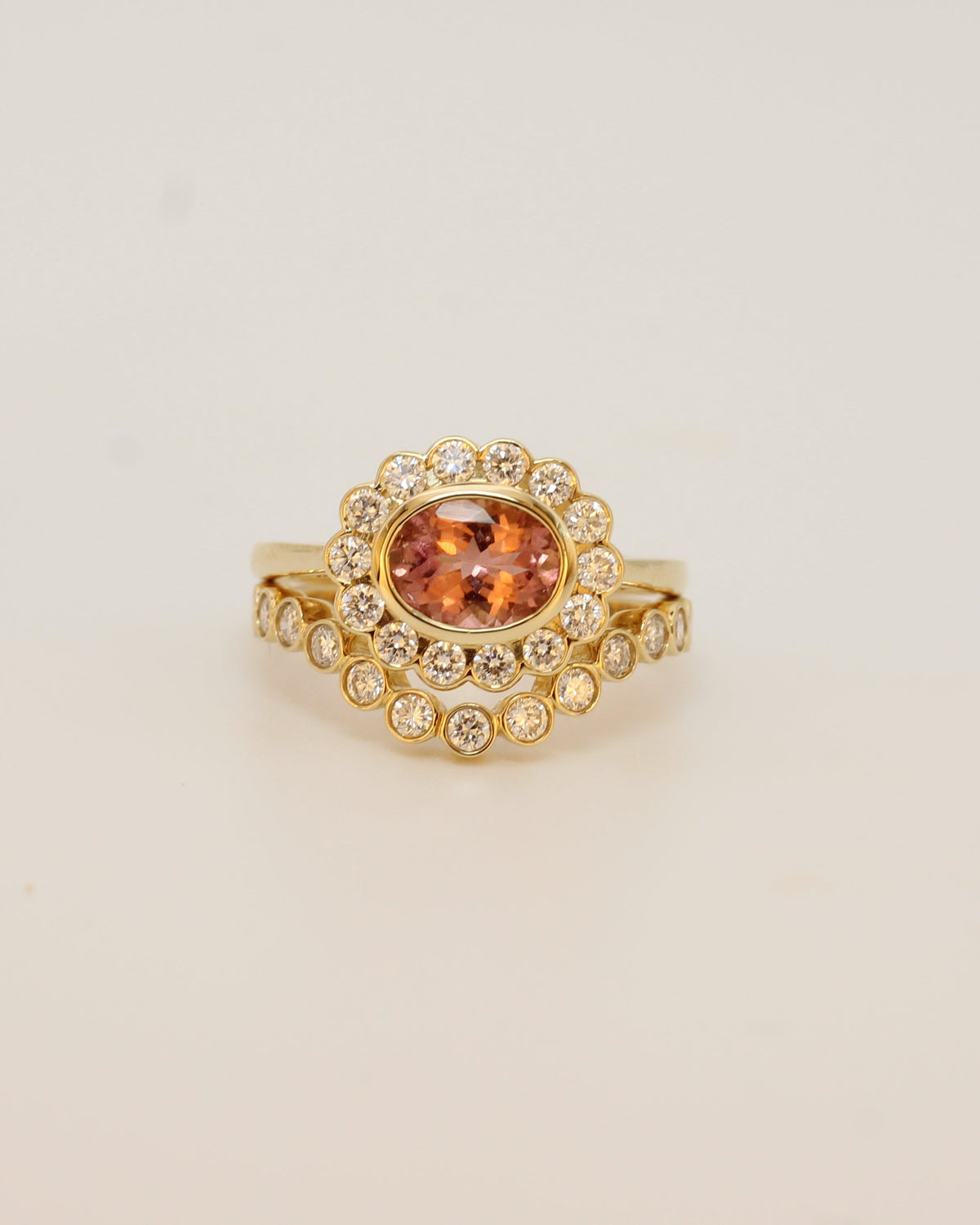 Wavy bezel diamond ring
