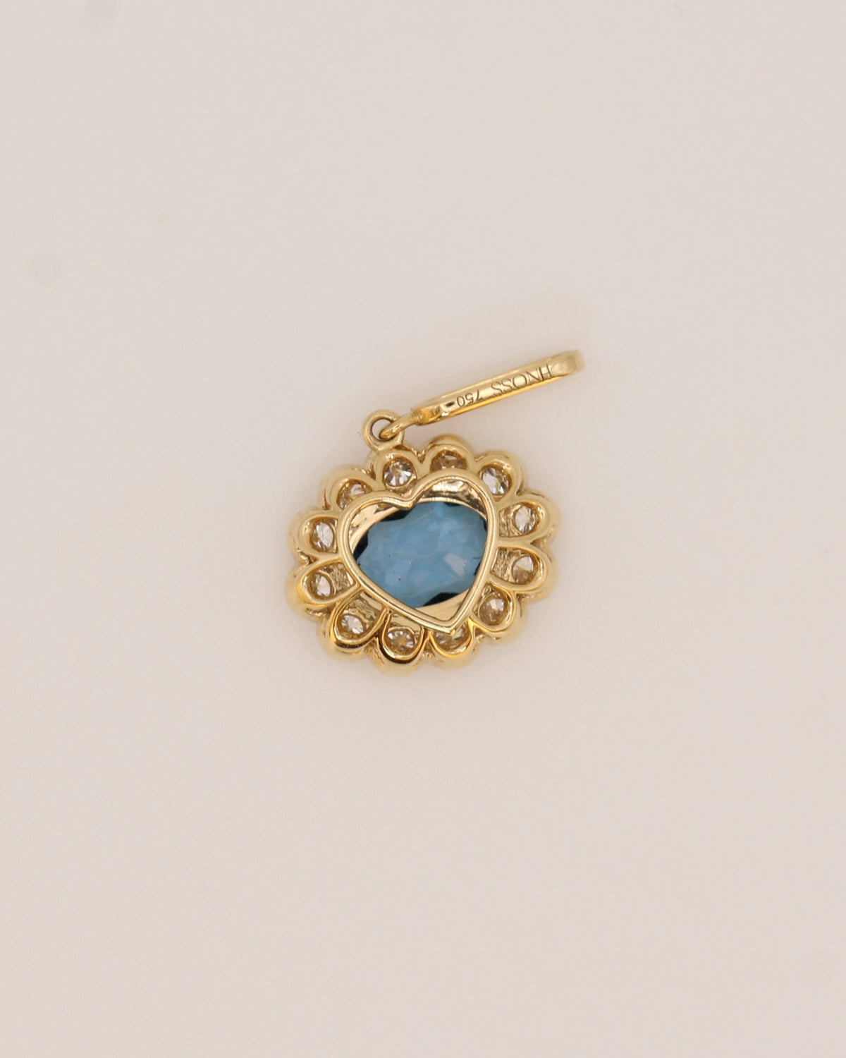Sideways Blue Topaz Floral Pendant